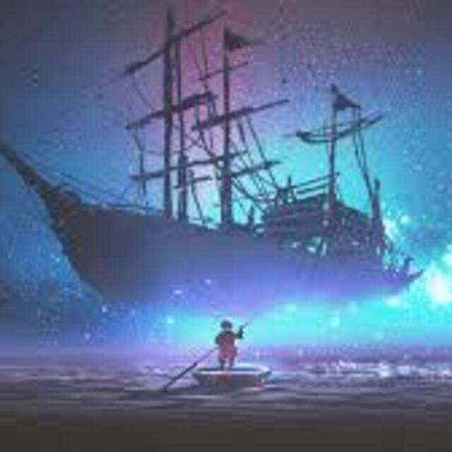 夜の海に浮かぶ船